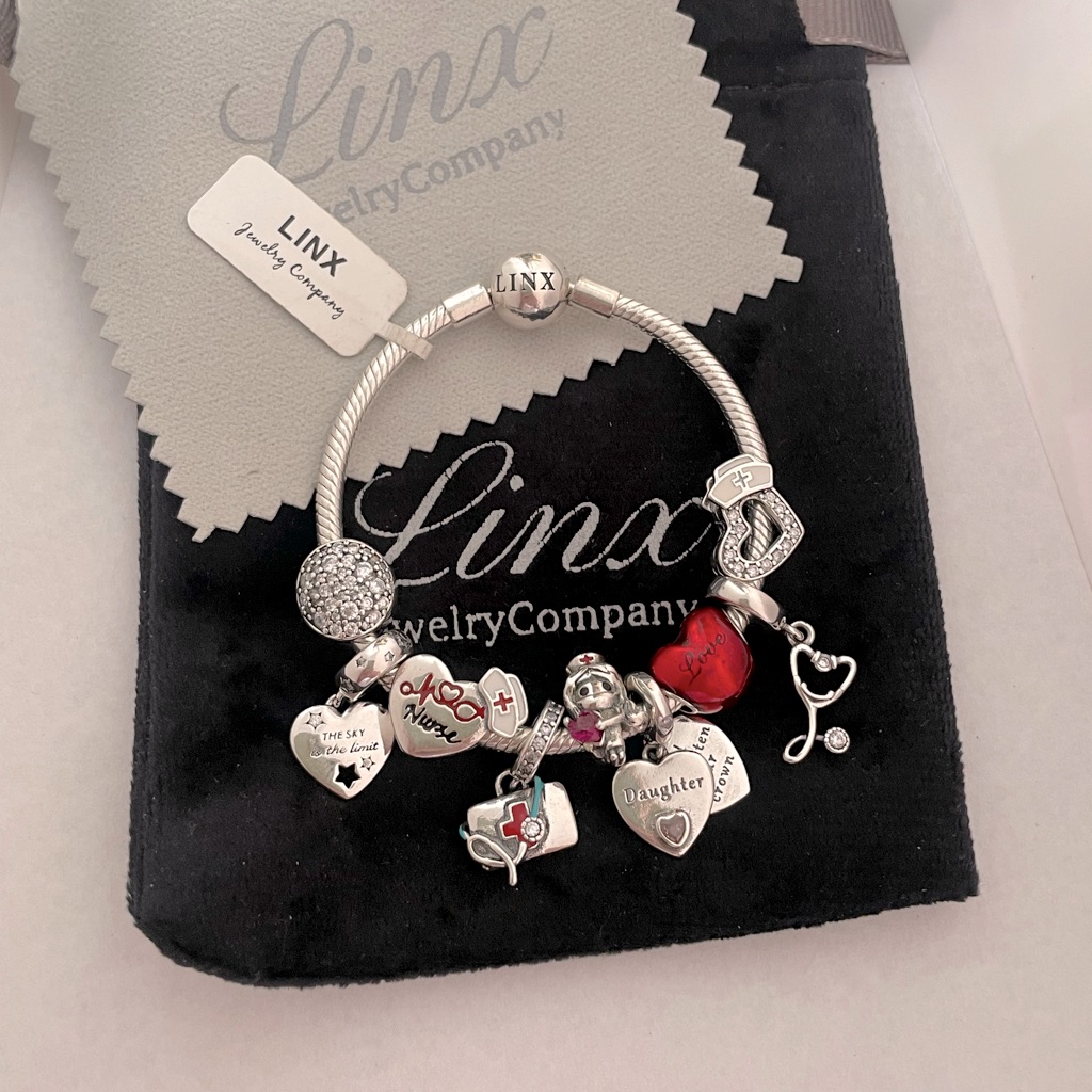 Linx Silver Snake Chain Bracelet With Daughter And Nurse Themed Charms